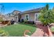 Spacious backyard featuring lawn, patio, BBQ grill, landscaping and privacy at 448 Bright Moon Ave, North Las Vegas, NV 89084