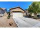 Charming single-story home featuring a two-car garage and well-maintained landscaping at 448 Bright Moon Ave, North Las Vegas, NV 89084