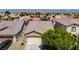 Charming single-story home featuring a neutral color palette, low maintenance landscaping, and an attached two-car garage at 448 Bright Moon Ave, North Las Vegas, NV 89084