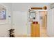 Hallway features closet, doors, cabinets, and neutral carpet at 448 Bright Moon Ave, North Las Vegas, NV 89084
