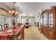 Open-concept space with dining area, fireplace, and view of the front entrance at 448 Bright Moon Ave, North Las Vegas, NV 89084