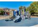 Community playground with a slide, climbing wall, and various play structures offer a fun outdoor space at 448 Bright Moon Ave, North Las Vegas, NV 89084