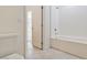 Bathroom featuring a bathtub with shower and tile flooring, designed for relaxation at 4566 Mansart Ct # 1104, North Las Vegas, NV 89031