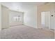 Bright Bonus Room with carpet flooring and natural light; a perfect space for many activities at 4566 Mansart Ct # 1104, North Las Vegas, NV 89031