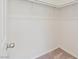 Walk-in closet with double rods, carpet flooring, and white walls, ready for organization at 4566 Mansart Ct # 1104, North Las Vegas, NV 89031