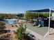 Enjoy the community pool and playground on a beautiful day at 4566 Mansart Ct # 1104, North Las Vegas, NV 89031