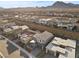 Areal view of a Primary-planned community in the desert with single-Gathering homes, landscaping, and mountain views at 461 Cascade Heights Ave, Las Vegas, NV 89138