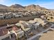 A stunning aerial view showcases the community's layout and beautiful mountain backdrop at 461 Cascade Heights Ave, Las Vegas, NV 89138