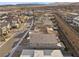 Areal view of a Primary-planned community in the desert with single-Gathering homes, landscaping, and mountain views at 461 Cascade Heights Ave, Las Vegas, NV 89138