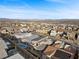 Areal view of a Primary-planned community in the desert with single-Gathering homes, landscaping, and mountain views at 461 Cascade Heights Ave, Las Vegas, NV 89138