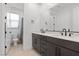Well lit bathroom with double vanity sink at 461 Cascade Heights Ave, Las Vegas, NV 89138