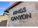 Kings Canyon community sign against a blue sky, showcasing the community's branding and entrance at 461 Cascade Heights Ave, Las Vegas, NV 89138