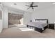 Spacious main bedroom with large sliding glass door and view of the backyard at 461 Cascade Heights Ave, Las Vegas, NV 89138