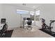 Home office space featuring natural light, modern exercise equipment, and a dedicated workspace at 461 Cascade Heights Ave, Las Vegas, NV 89138