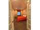 Bright bedroom featuring carpet, a ceiling fan, and a large window at 4837 Skyraider St, North Las Vegas, NV 89031