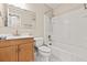 Bright bathroom featuring a shower-tub combo and wood vanity at 4920 Larkspur St, Las Vegas, NV 89120