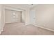 Bedroom with neutral walls, carpet, a double-hung window, and closet with mirrored sliding doors at 4920 Larkspur St, Las Vegas, NV 89120