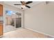 Dining area with sliding glass doors that lead to the backyard at 4920 Larkspur St, Las Vegas, NV 89120