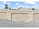 The garage has a neutral exterior and is surrounded by a paved driveway at 4920 Larkspur St, Las Vegas, NV 89120