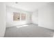 Spacious bedroom with carpet, neutral paint and natural light from large windows at 50 Barrio Alto Ct, Henderson, NV 89011