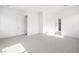Bright, carpeted bedroom with neutral walls and minimalist design at 50 Barrio Alto Ct, Henderson, NV 89011