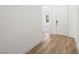 Entryway with modern laminate flooring and white walls at 50 Barrio Alto Ct, Henderson, NV 89011