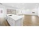 Spacious kitchen featuring a large island with a sink, and an open floor plan at 50 Barrio Alto Ct, Henderson, NV 89011