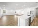 Open concept kitchen with a large island, stainless steel appliances, and ample counter space at 50 Barrio Alto Ct, Henderson, NV 89011