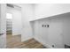Bright laundry room with shelving, appliances, and modern design at 50 Barrio Alto Ct, Henderson, NV 89011