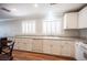 Bright kitchen featuring white cabinetry, neutral countertops, and stainless steel appliances at 5000 Charlo Dr, Las Vegas, NV 89131