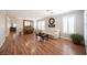A spacious living room featuring hardwood floors, white trim and neutral paint at 5000 Charlo Dr, Las Vegas, NV 89131