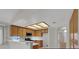 Well-lit kitchen featuring ample cabinet space and a breakfast bar, perfect for casual dining at 5244 Velazco Ln, Las Vegas, NV 89130