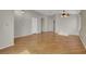 Spacious living room with hardwood floors and a ceiling fan at 5244 Velazco Ln, Las Vegas, NV 89130