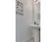 Clean half-bathroom features a modern, pedestal sink and decor at 5256 Sherwood Forest Ln, Las Vegas, NV 89122