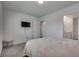 This bedroom features a plush carpet and a TV at 5256 Sherwood Forest Ln, Las Vegas, NV 89122