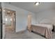 This bedroom features a plush carpet and a decorative headboard at 5256 Sherwood Forest Ln, Las Vegas, NV 89122