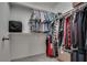 This walk-in closet features two rods and storage above at 5256 Sherwood Forest Ln, Las Vegas, NV 89122
