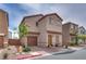 Charming two-story home with a well-maintained front yard and attached garage at 5256 Sherwood Forest Ln, Las Vegas, NV 89122