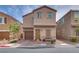 Charming two-story home with brick driveway, desert landscaping and covered front porch at 5256 Sherwood Forest Ln, Las Vegas, NV 89122