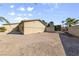 Exterior shot showing a large backyard with desert landscaping and a block wall at 5518 Avenida Vaquero, Las Vegas, NV 89108
