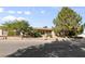 Charming single-story home with a lush front yard and mature shade trees at 5518 Avenida Vaquero, Las Vegas, NV 89108