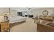 Expansive main bedroom with dual beds, comfortable seating, and tasteful decor, providing a relaxing retreat at 5518 Avenida Vaquero, Las Vegas, NV 89108