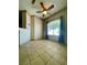 Bright dining area with tile floors, modern ceiling fan and large window with blinds at 5525 W Flamingo Rd # 2037, Las Vegas, NV 89103