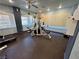 Community gym with weight training equipment, treadmill, ceiling fan and natural light at 5525 W Flamingo Rd # 2037, Las Vegas, NV 89103