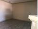 This living room offers a spacious area and attractive wood-look floors for a modern design at 5525 W Flamingo Rd # 2037, Las Vegas, NV 89103