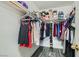 Walk in closet with ample storage for clothes, shoes, and accessories at 6048 Pele St, North Las Vegas, NV 89031