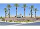 Community center at Solera at Stallion Mountain features well-maintained landscaping and palm trees at 6072 Canter Glen Ave, Las Vegas, NV 89122