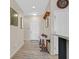 Inviting entryway with a neutral color scheme, decorative rug, and stylish accents at 6072 Canter Glen Ave, Las Vegas, NV 89122
