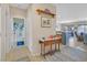 Spacious hallway leads to the bathroom, kitchen, and living room for convenient access at 6072 Canter Glen Ave, Las Vegas, NV 89122