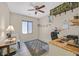 Cozy office with a ceiling fan and desk area is perfect for remote work or studying at 6072 Canter Glen Ave, Las Vegas, NV 89122